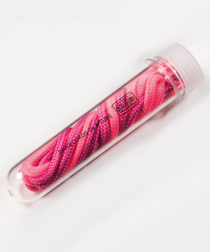 Tryck din logga på Skosnören från AWDis Just Hoods - Anpassa Snörningar i ett rör i färgen Mellanrosa One Size för företag, föreningar och privatpersoner