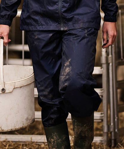 Tryck din logga på Byxor från Regatta Professional - Anpassa Överdragsbyxor med packning för damer i färgen för företag, föreningar och privatpersoner